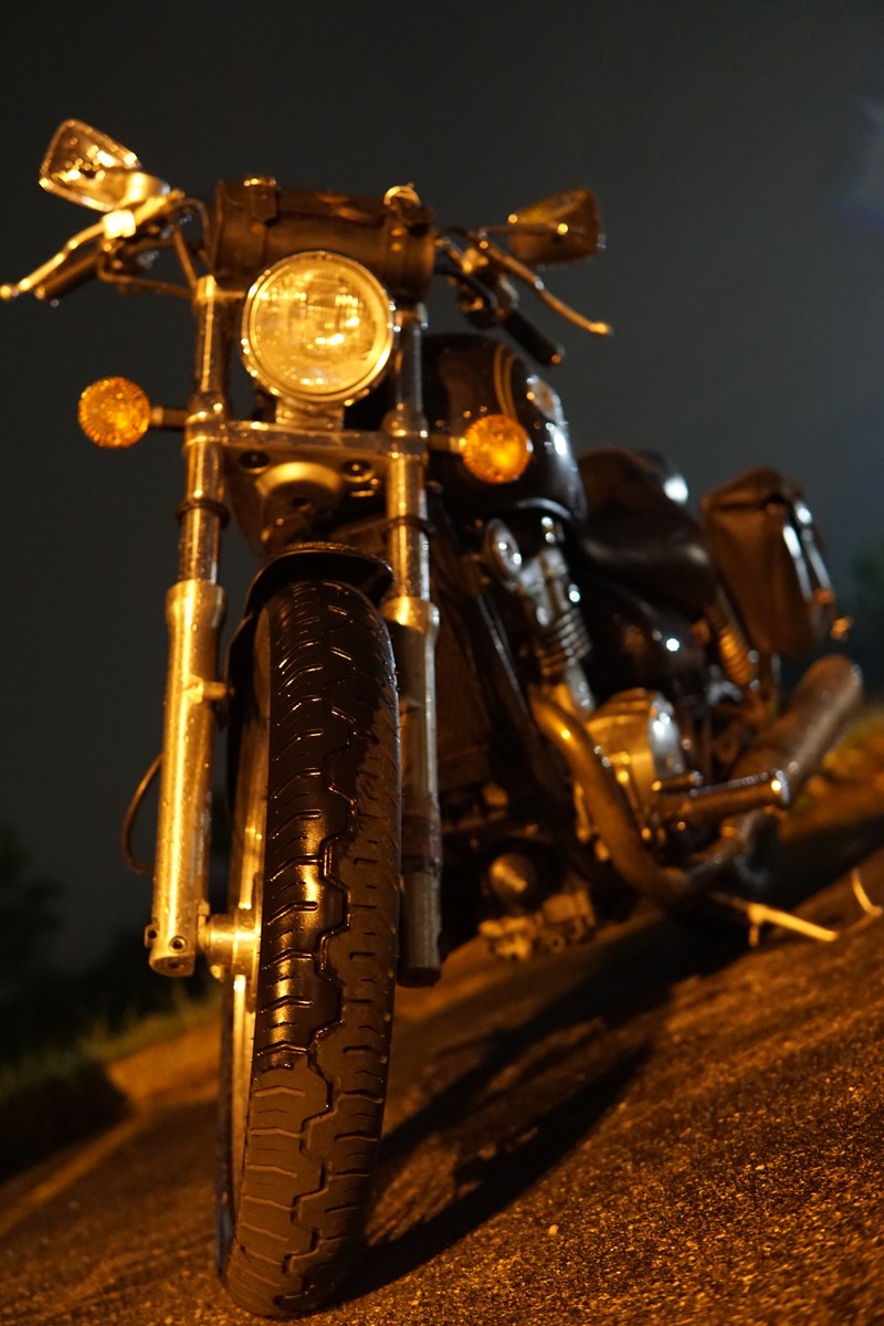 Motorcycle parked at night